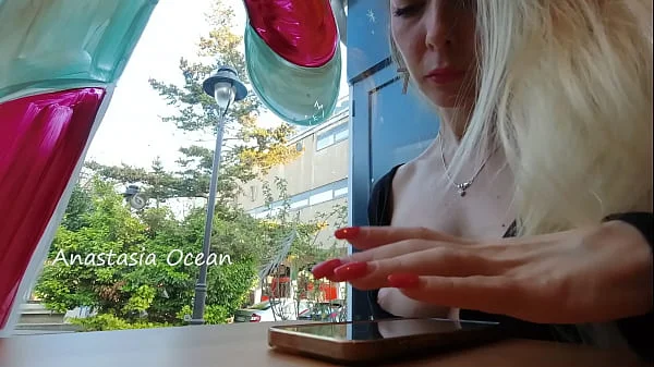 Super model Anastasia Ocean flashes her natural breasts in a public cafe