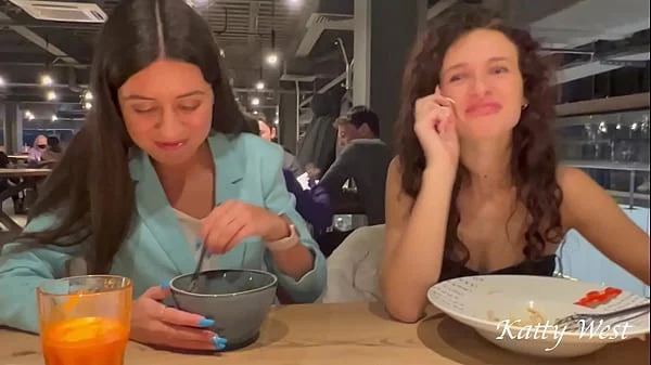 Two shameless chicks have lunch without panties at the mall in public