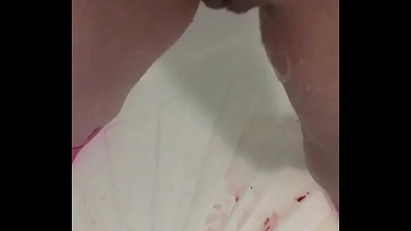 Brunette pissing during her period standing change pad showing dirty pussy and dirty pad