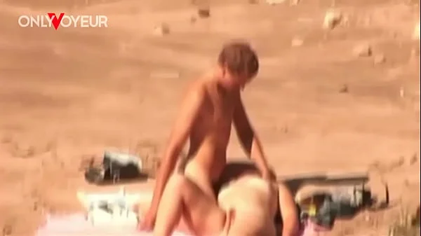 Beach Voyeur. Horny teen couple fucking on a public beach and cumming together