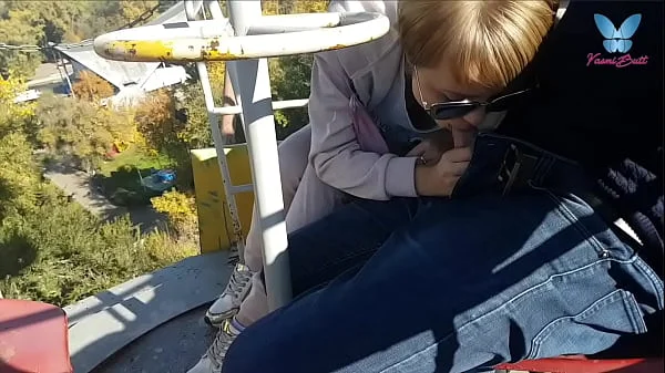 Public blowjob on the ferris wheel from shameless whore